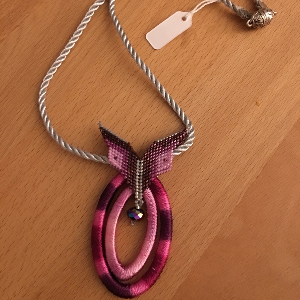 Mixture of Japanese seed beads and silk thread.